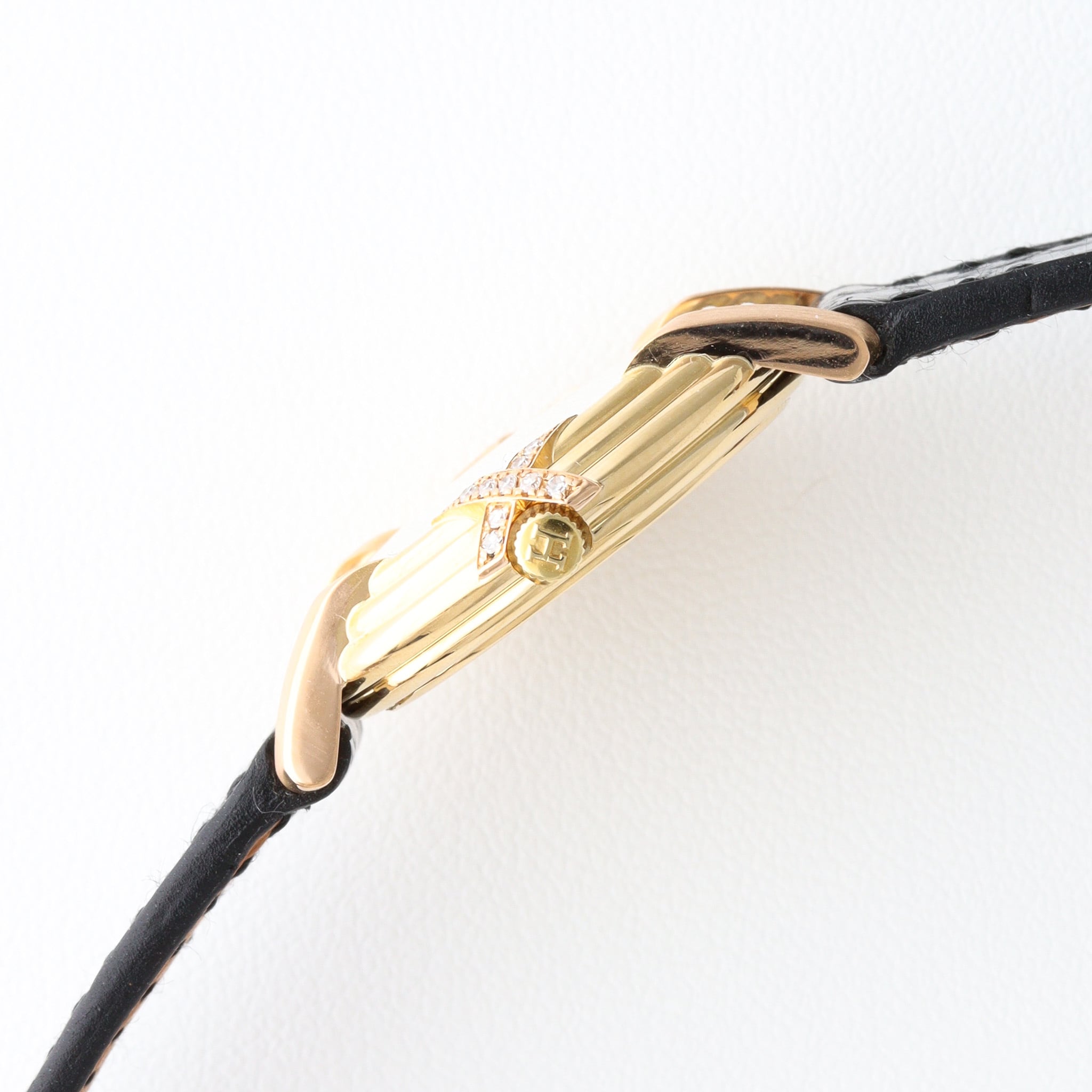 エルメス リボンラウンド ゴールド×レザー ダイヤモンド