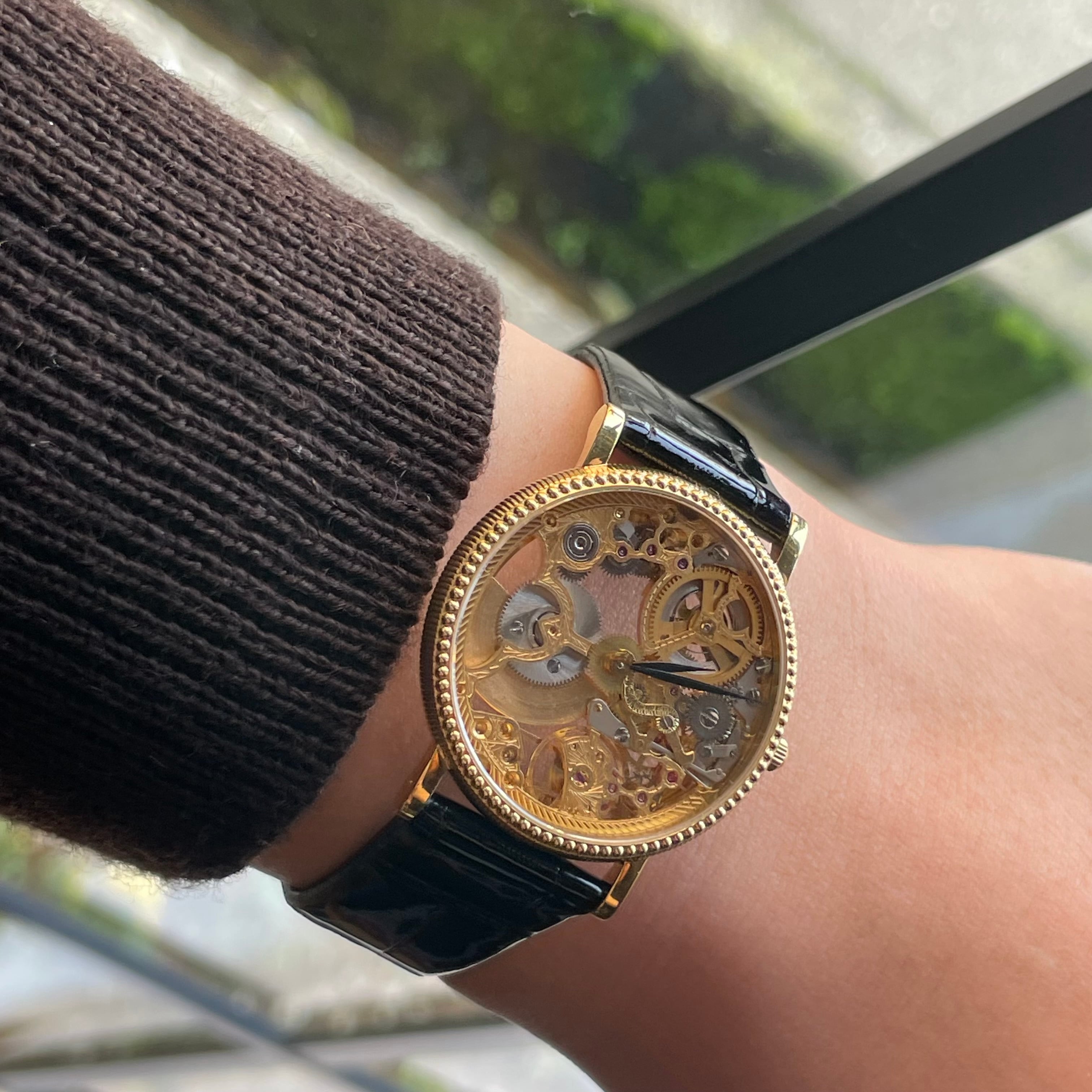 UNIVERSAL GENEVE スケルトン 18kYG 自動巻き マイクロローター 151.11.662